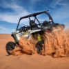 Polarize Dune Buggy driving through rocky paths.